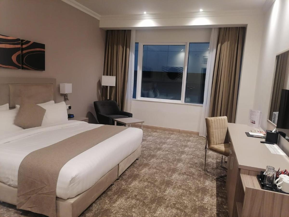 Gloria Hotel & Suites Doha Extérieur photo